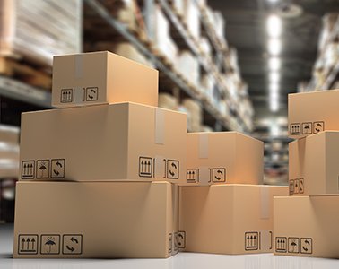 Cardboard boxes on blur storage warehouse shelves background. 3d
